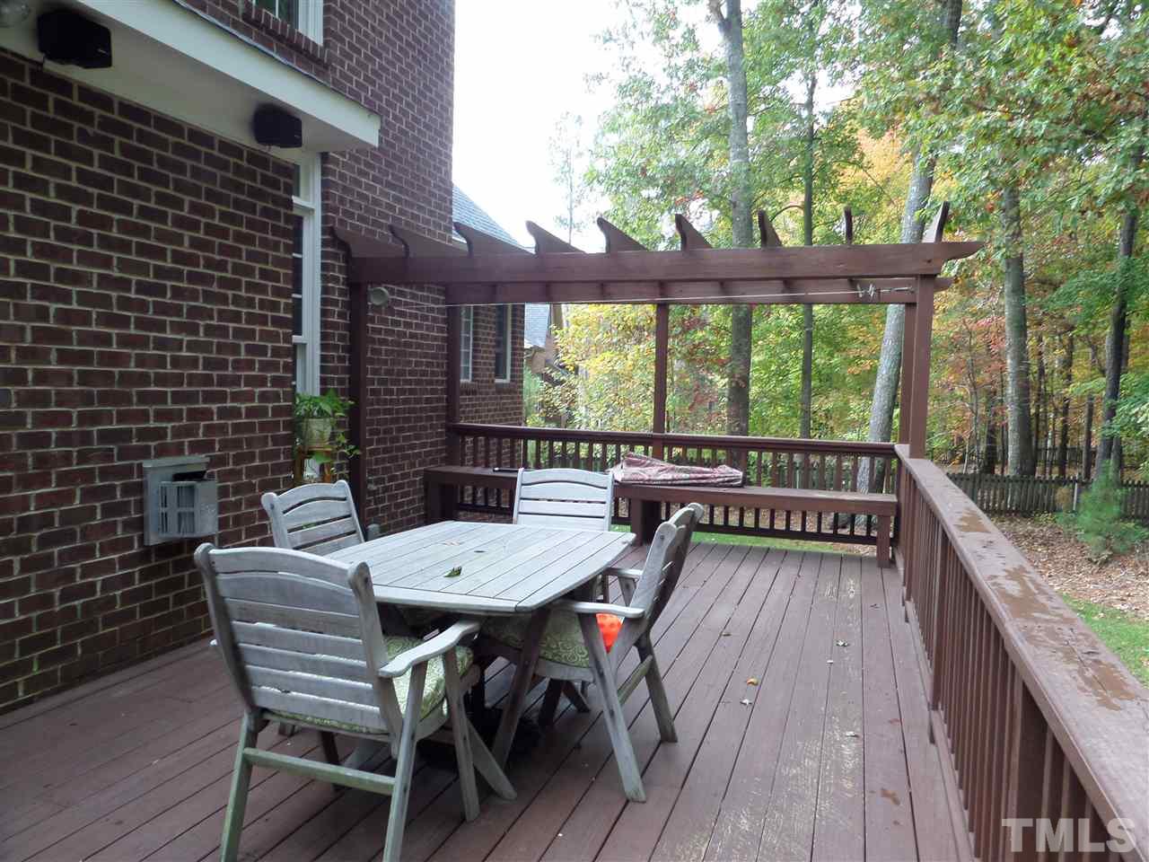 5236 Levering Mill Road Apex, NC 27539 - Photo 24 of 25 Enjoy the oversized Deck with bench seating for family time or entertaining friends or neighbors.