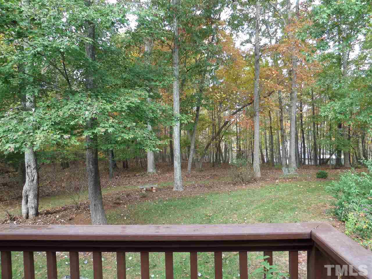 5236 Levering Mill Road Apex, NC 27539 - Photo 25 of 25 Wooded back yard view from deck. private time to lounge for a quick nap or a good read.