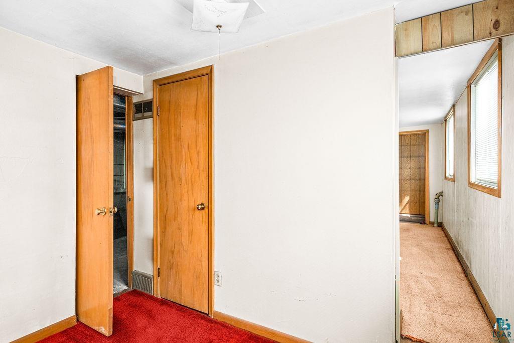 4930 Oneida Street Duluth, MN 55804 - Photo 12 of 19 Unfurnished bedroom featuring carpet flooring