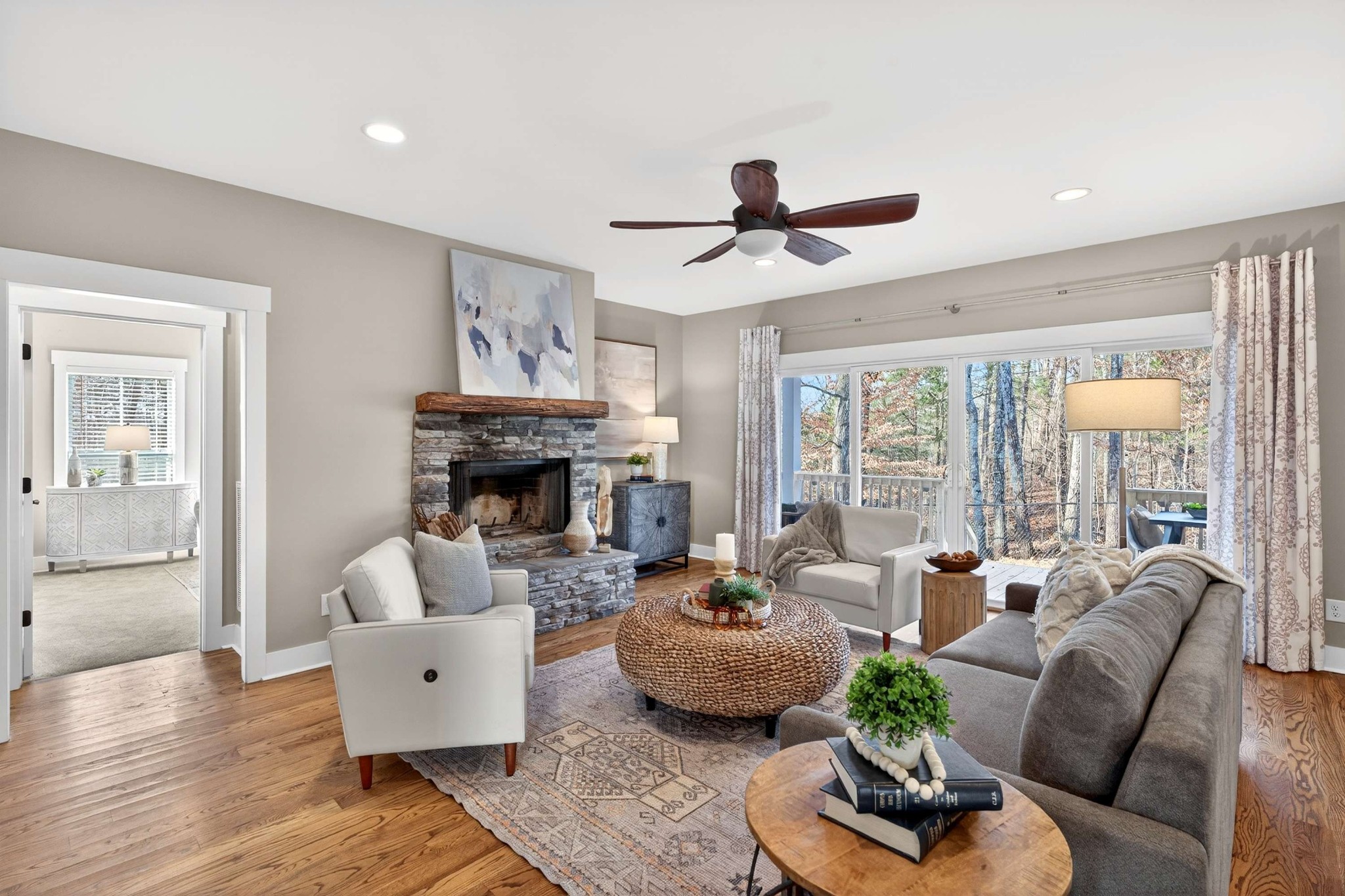 4852 Ash Hill Road Spring Hill, TN 37174 - Photo 20 of 45 a living room with furniture and a fireplace
