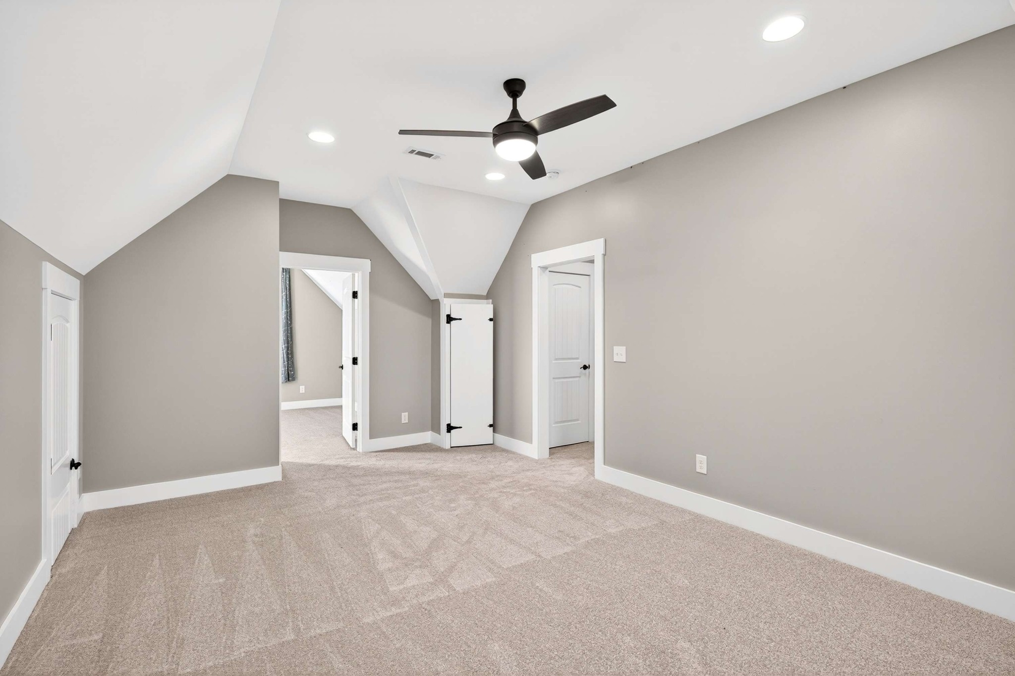 4852 Ash Hill Road Spring Hill, TN 37174 - Photo 36 of 45 a view of an empty room with a ceiling fan