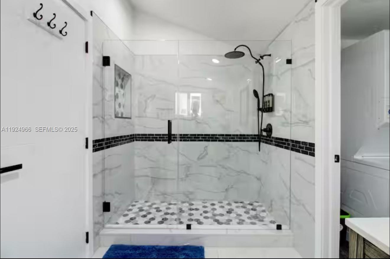 470 Northeast 110th Street Miami, FL 33161 - Photo 11 of 20 a bathroom with a shower