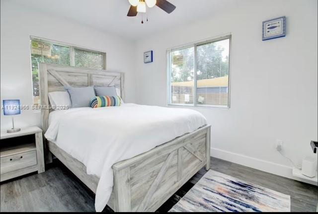 470 Northeast 110th Street Miami, FL 33161 - Photo 13 of 20 a bedroom with a bed and a window