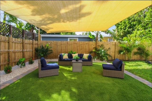 470 Northeast 110th Street Miami, FL 33161 - Photo 15 of 20 a view of a couches in patio and a yard