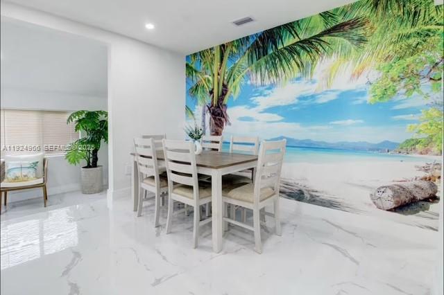 470 Northeast 110th Street Miami, FL 33161 - Photo 6 of 20 a view of a chairs and table in patio