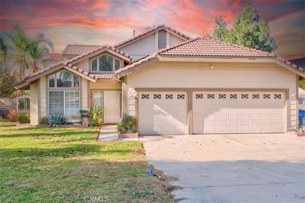 6784 Mitchell Avenue Riverside, CA 92505 - Photo 1 of 1 a front view of a house with a yard