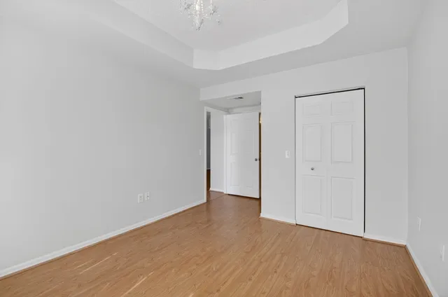 a view of a swimming pool with lounge chairs