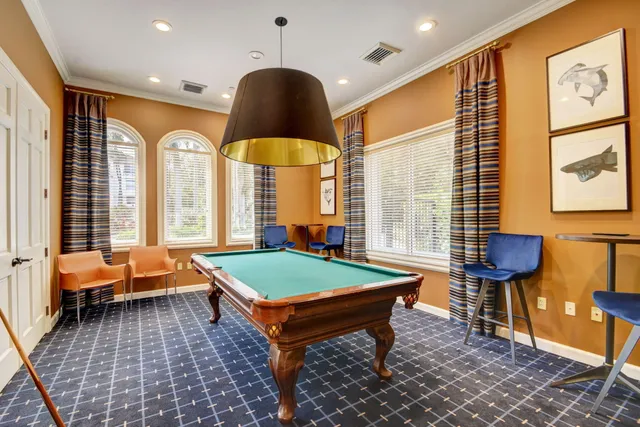 a view of a livingroom with furniture window and outside view