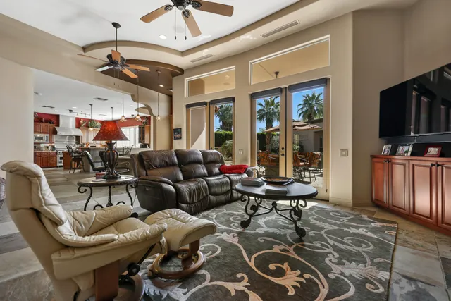 a kitchen with stainless steel appliances granite countertop a stove and a sink