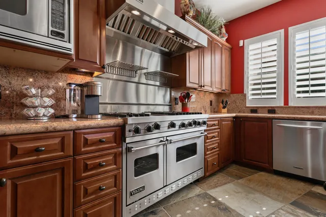 a spacious bathroom with a double vanity sink and a mirror