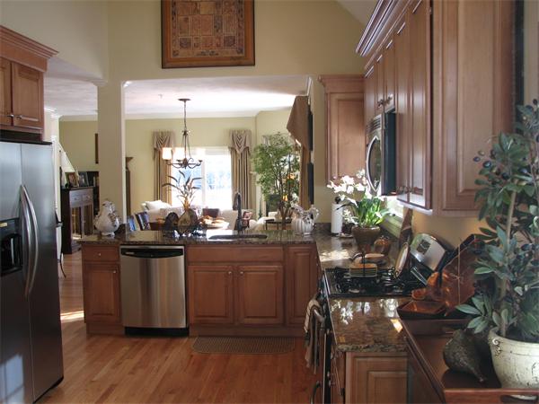 15 A Trail Ridge Way, Unit 49 Harvard, MA 01451 - Photo 8 of 30 a view of a kitchen with furniture and stainless steel appliances
