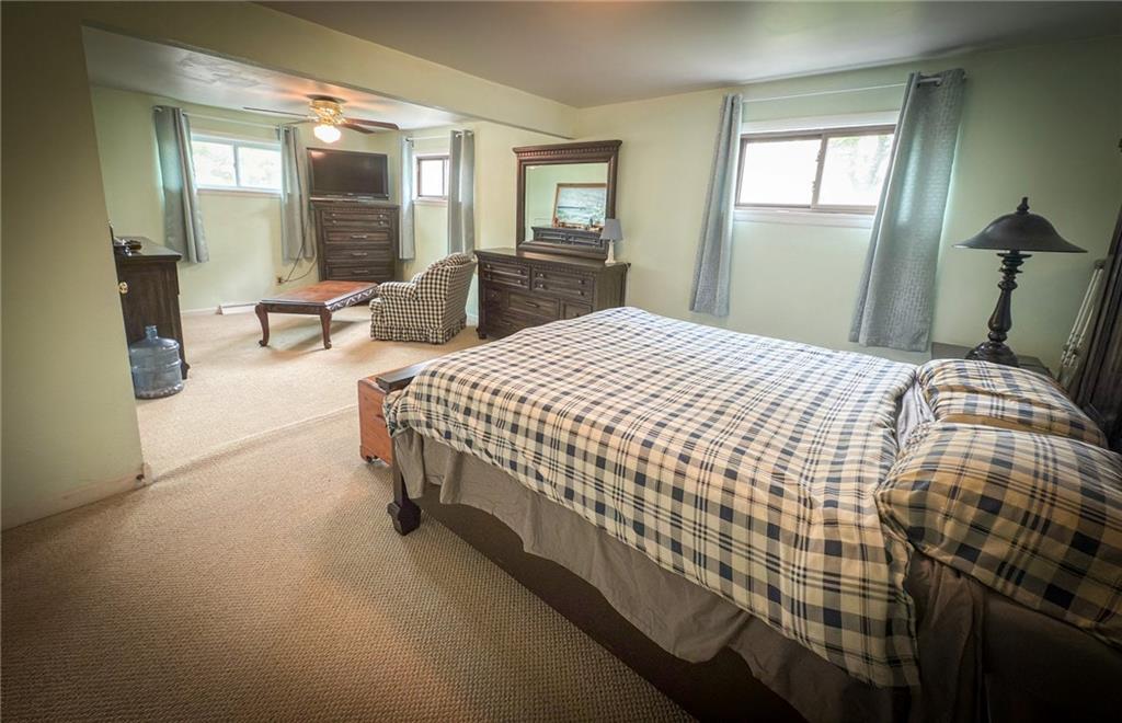 829 Saxonburg Road Butler, PA 16002 - Photo 19 of 49 a bedroom with a bed and window