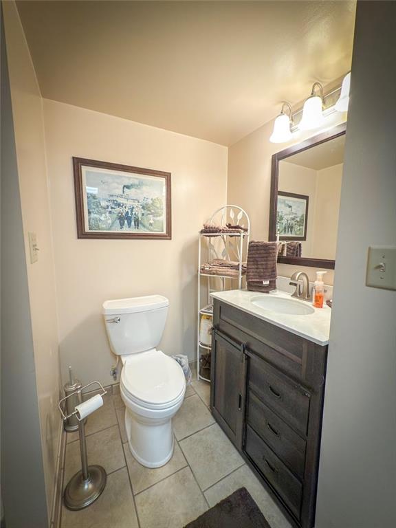 829 Saxonburg Road Butler, PA 16002 - Photo 32 of 49 a bathroom with a toilet sink and mirror