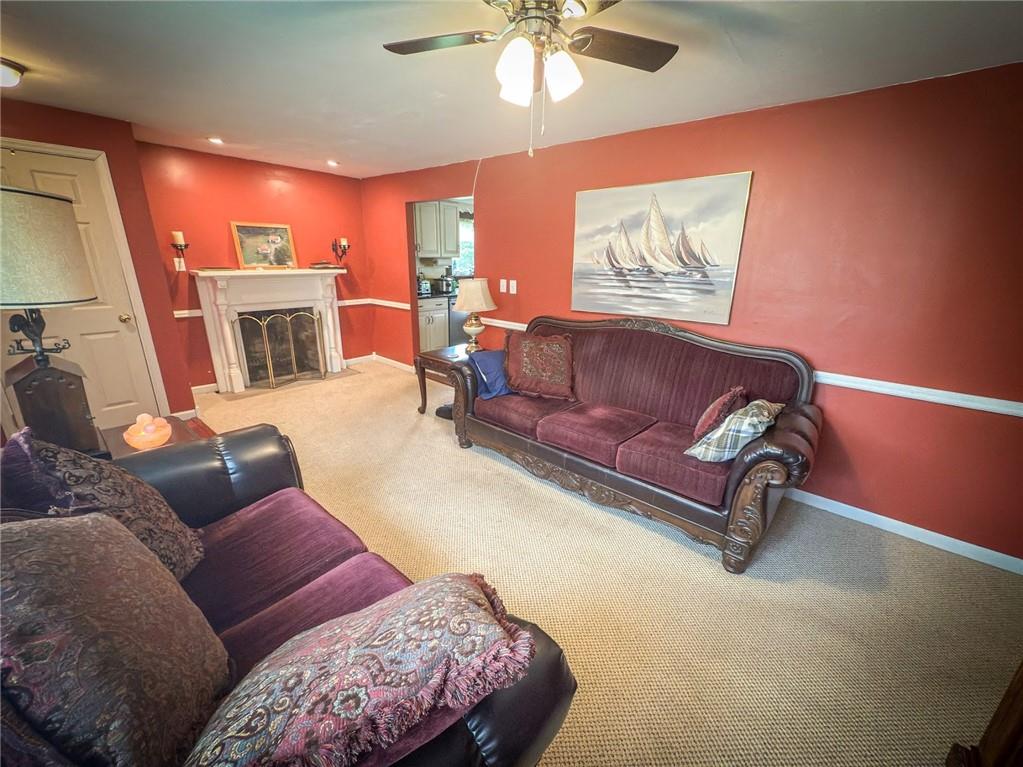 829 Saxonburg Road Butler, PA 16002 - Photo 5 of 49 a living room with furniture and a fireplace