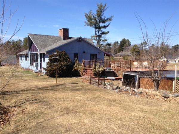 43 1/2 Bethany Road Monson, MA 01057 - Photo 11 of 13 a view of a house with a yard