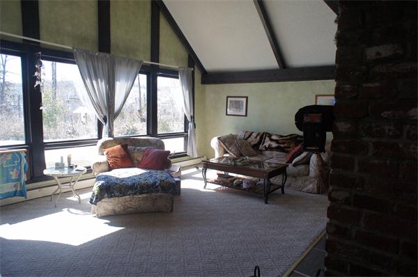 43 1/2 Bethany Road Monson, MA 01057 - Photo 6 of 13 a living room with furniture and a large window