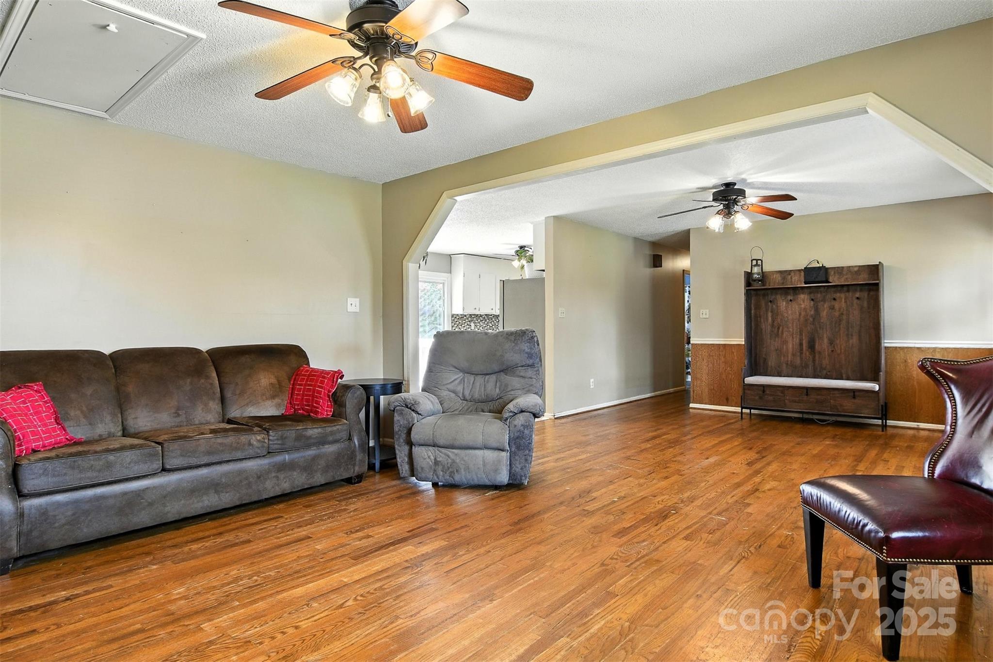 952 30th Street Northeast Conover, NC 28613 - Photo 13 of 36 a living room with furniture and a wooden floor