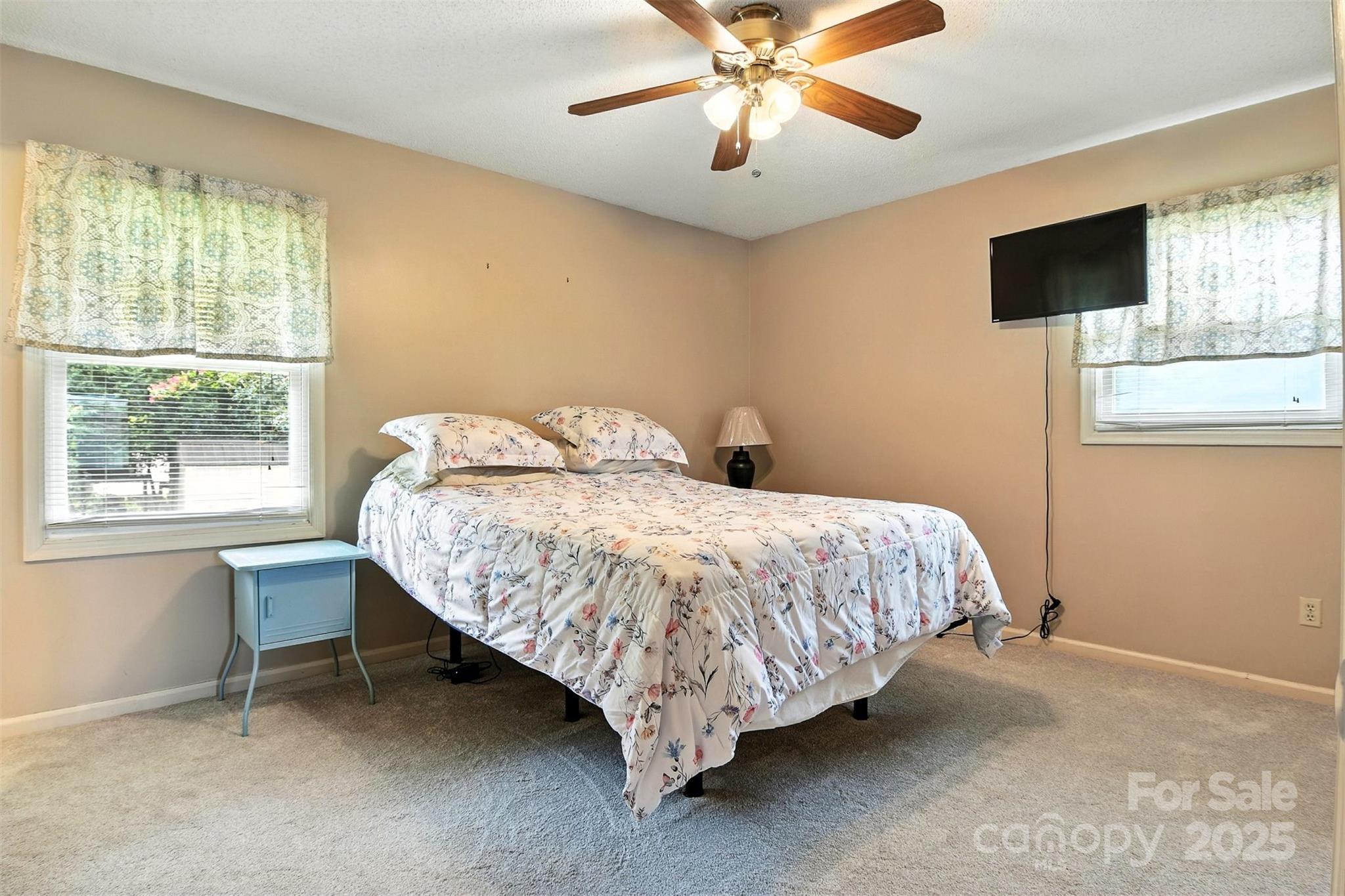 952 30th Street Northeast Conover, NC 28613 - Photo 19 of 36 a bed sitting in a bedroom next to a window