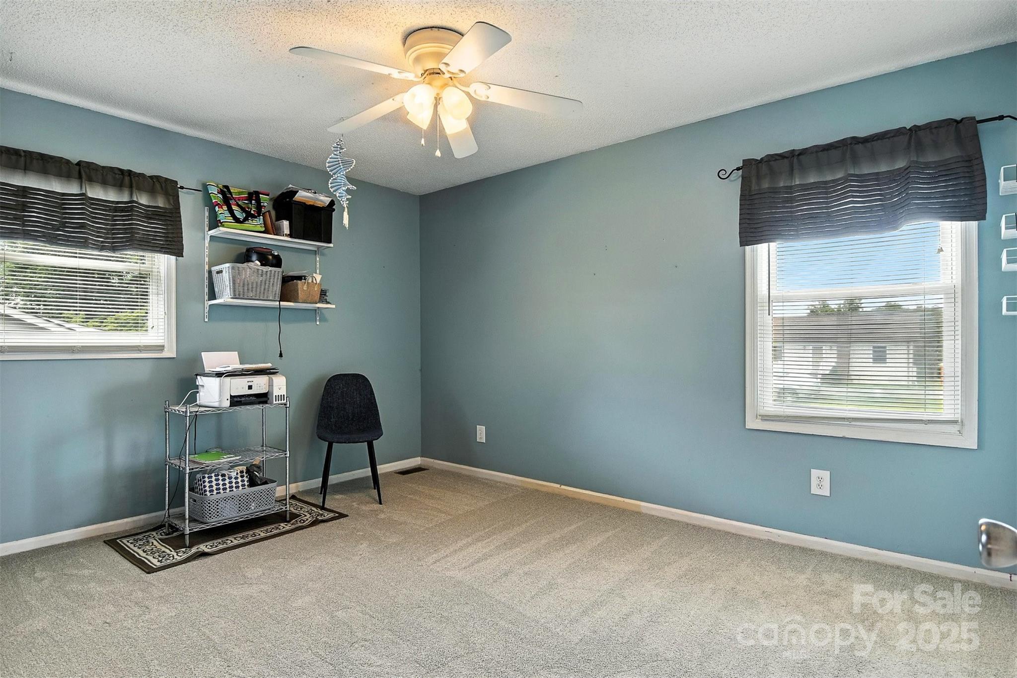 952 30th Street Northeast Conover, NC 28613 - Photo 22 of 36 a view of a workspace with furniture and a window