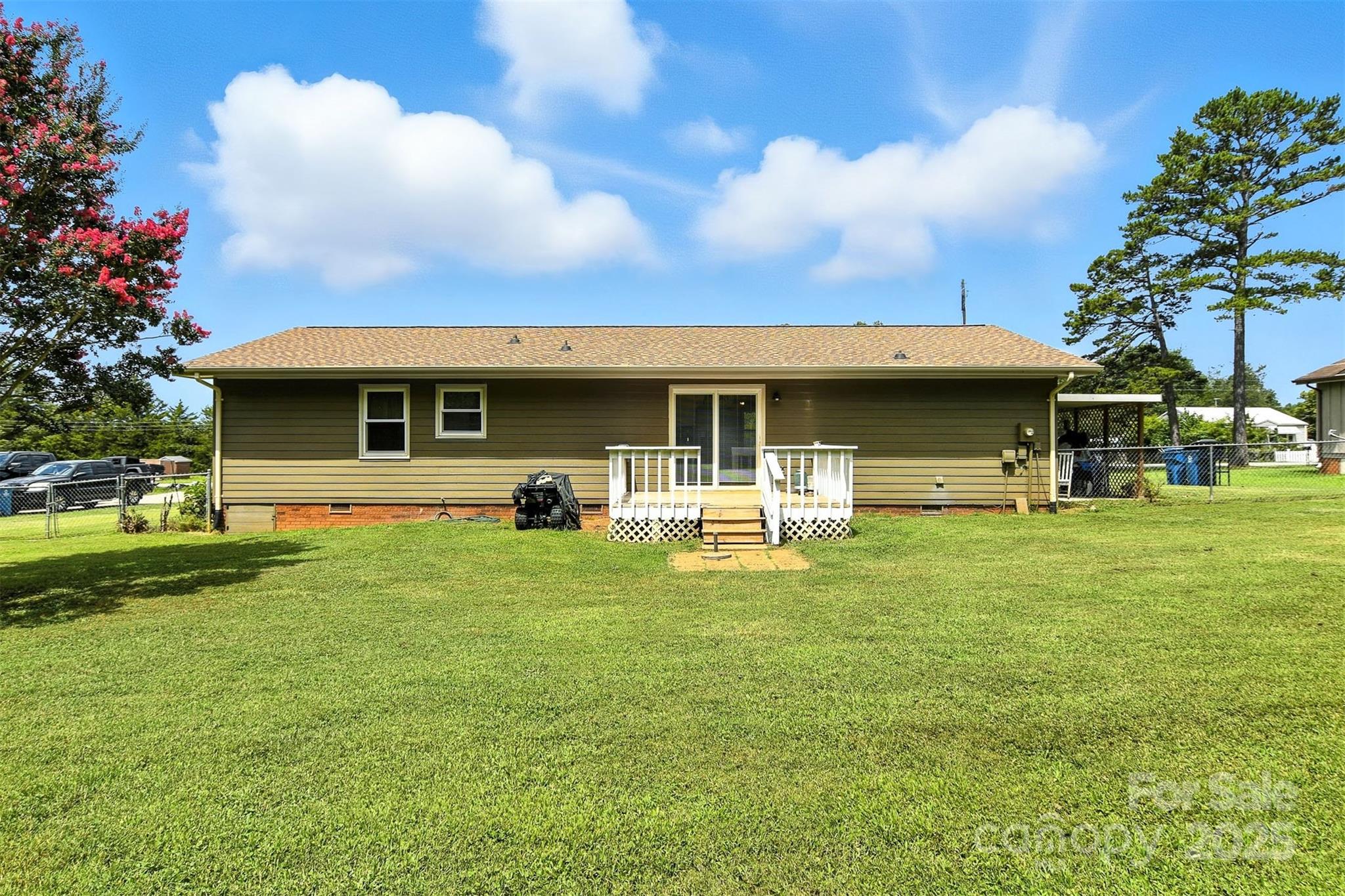 952 30th Street Northeast Conover, NC 28613 - Photo 29 of 36 a front view of a house with a garden and trees