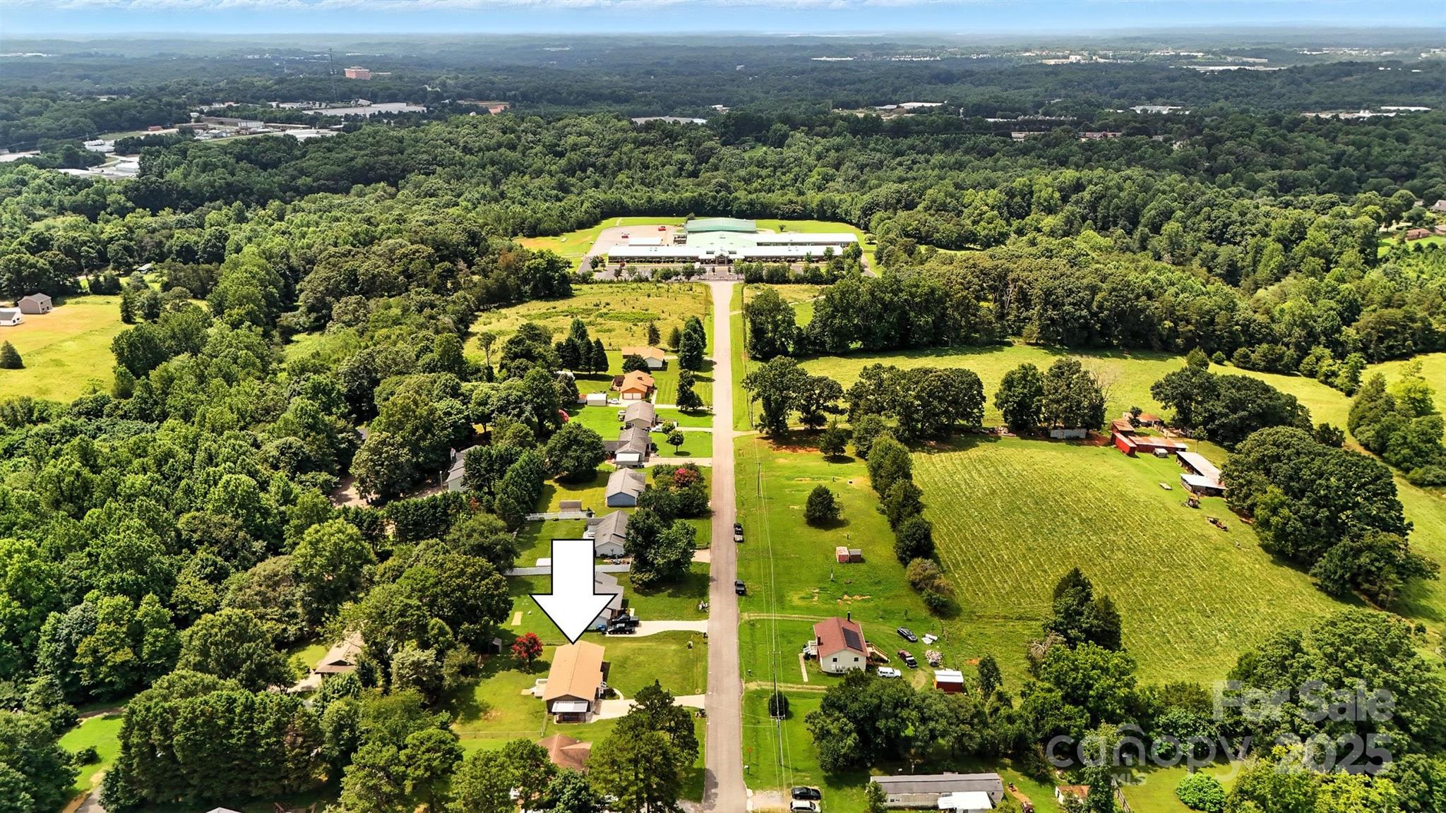 952 30th Street Northeast Conover, NC 28613 - Photo 32 of 36 an aerial view of residential houses with outdoor space and trees