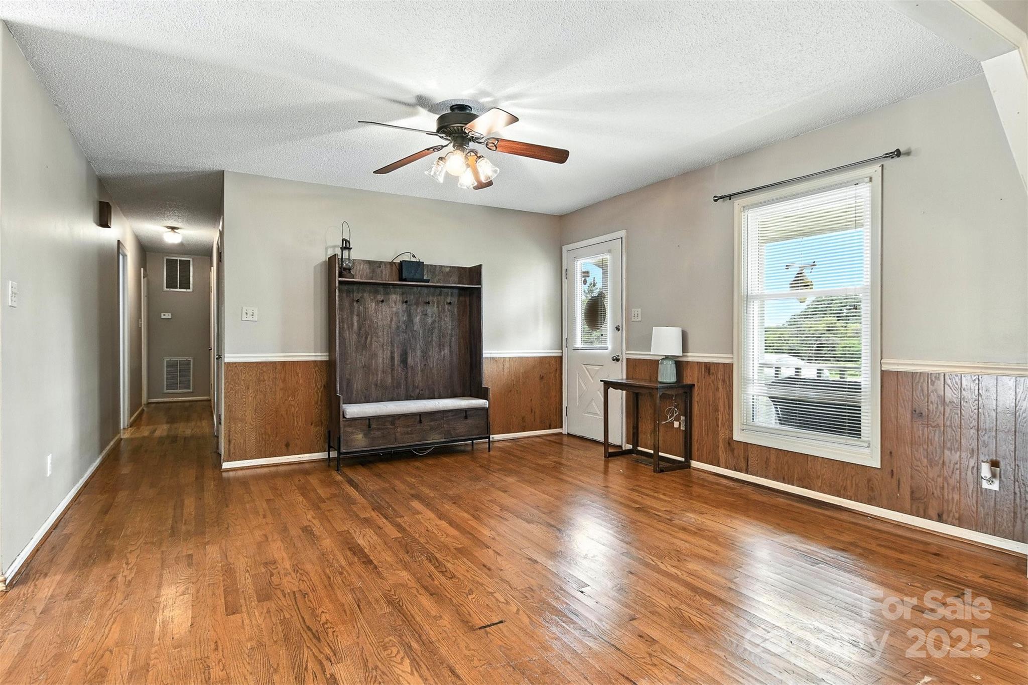 952 30th Street Northeast Conover, NC 28613 - Photo 6 of 36 a living room with furniture and a wooden floor