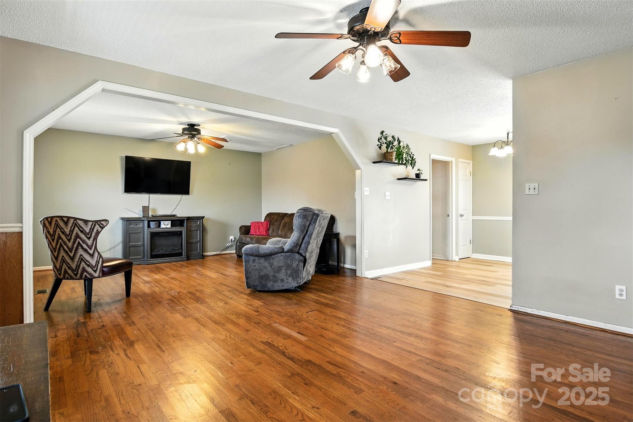 952 30th Street Northeast Conover, NC 28613 - Photo 7 of 36 a living room with furniture and a flat screen tv