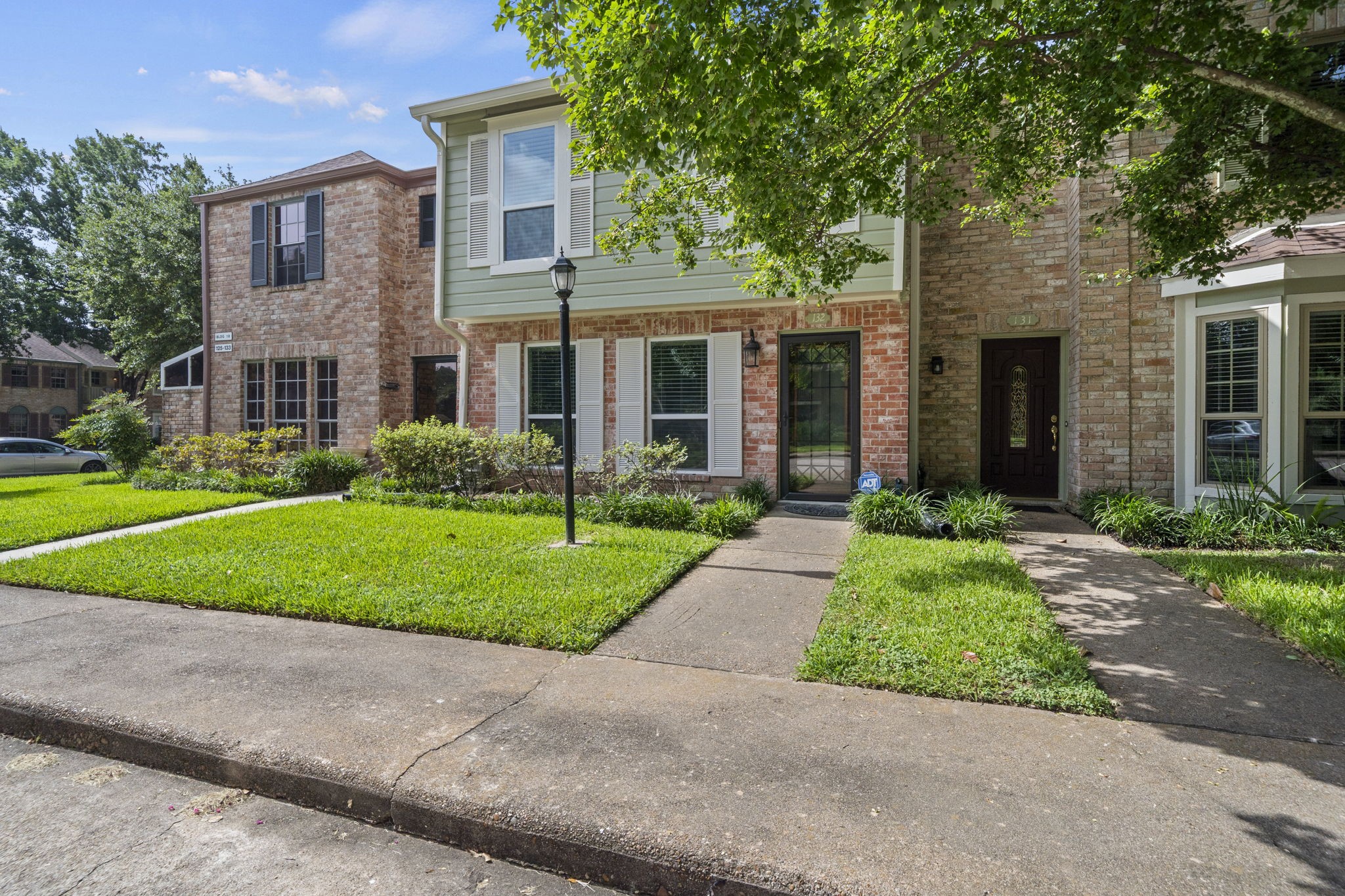 5801 Lumberdale Road, Unit 132 Houston, TX 77092 - Photo 31 of 33 Inviting front walkway leading to the private entrance.