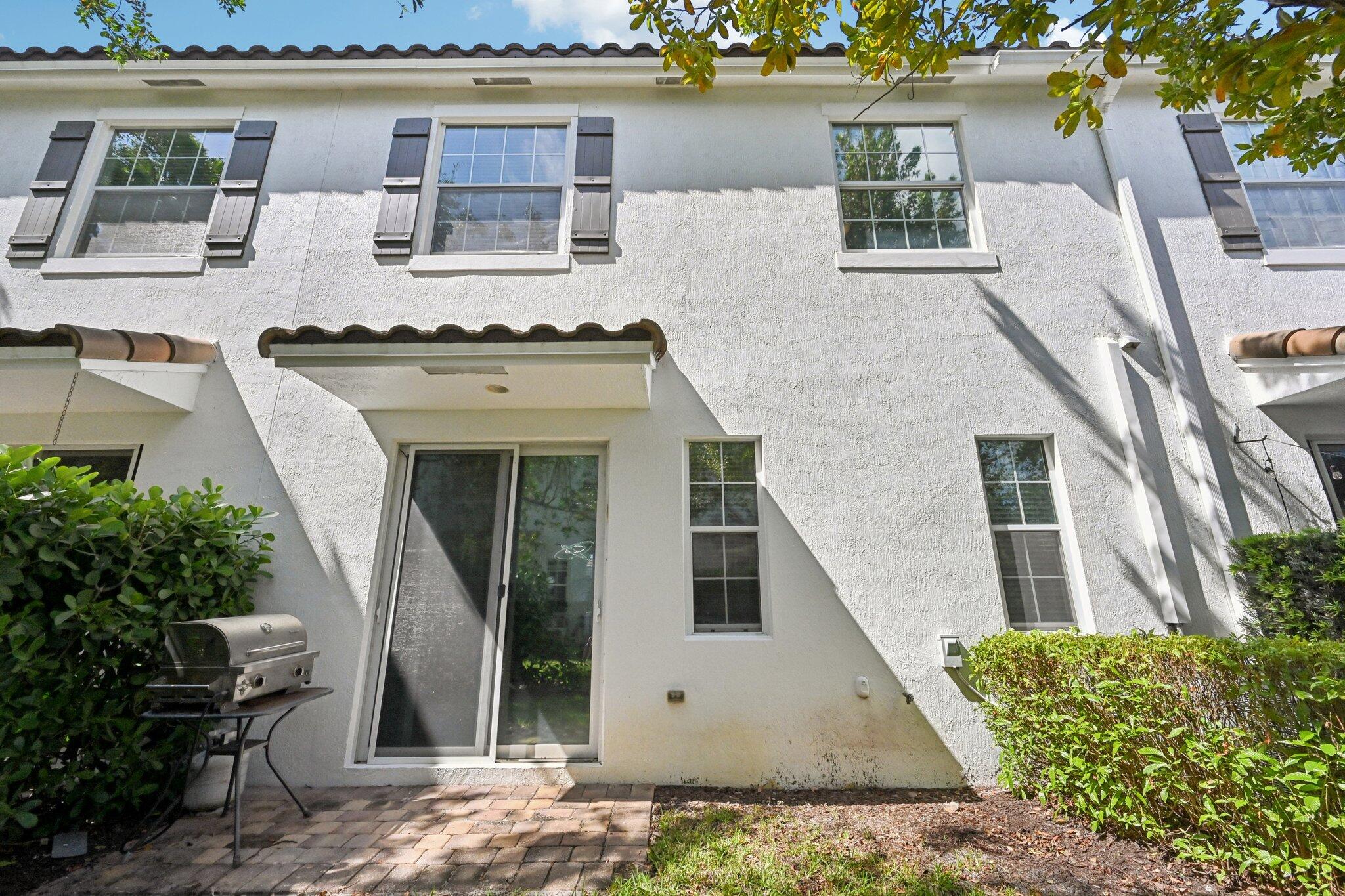 482 Graham Place Boynton Beach, FL 33435 - Photo 28 of 39 front view of house with a yard