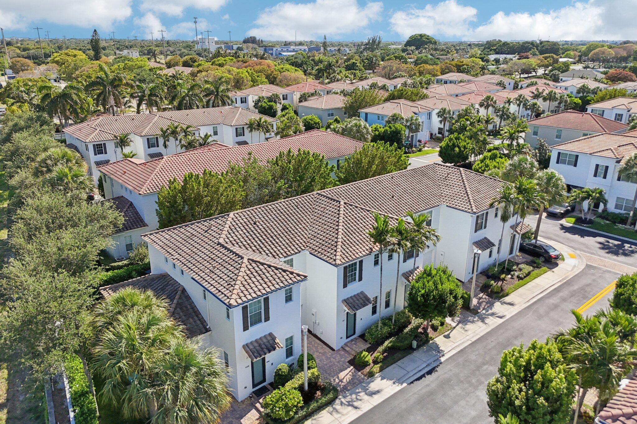 482 Graham Place Boynton Beach, FL 33435 - Photo 29 of 39 an aerial view of a house with a garden