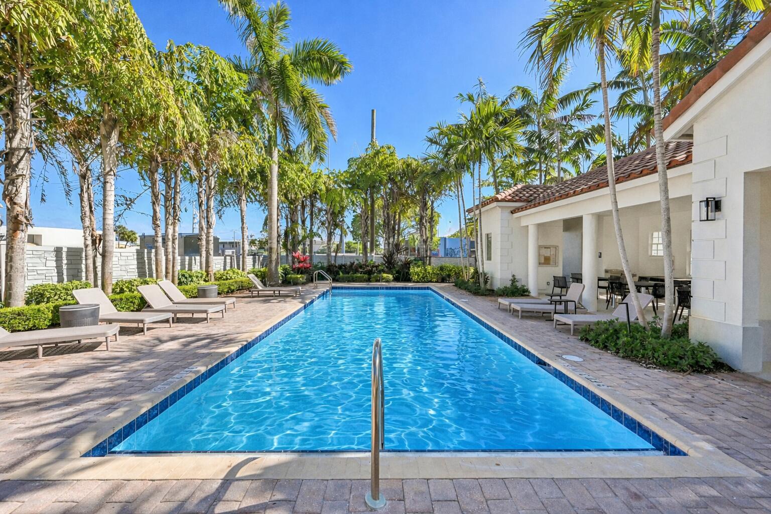 482 Graham Place Boynton Beach, FL 33435 - Photo 31 of 39 a view of a house with swimming pool