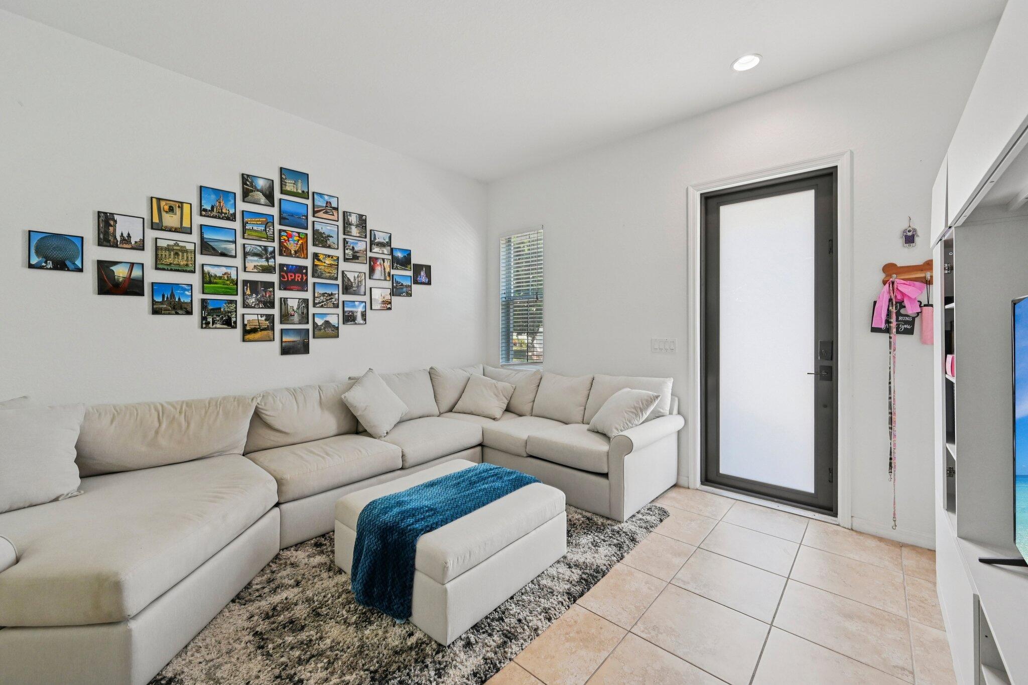 482 Graham Place Boynton Beach, FL 33435 - Photo 4 of 39 a living room with furniture and a rug