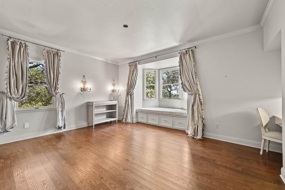 4207 Bennedict Lane Austin, TX 78746 - Photo 16 of 27 a view of a livingroom with furniture wooden floor and window