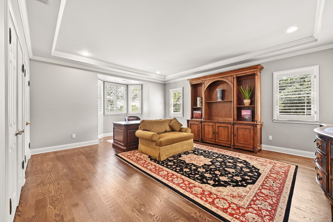 4207 Bennedict Lane Austin, TX 78746 - Photo 20 of 27 a living room with furniture rug and window