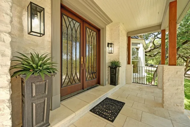 a porch with a glass door