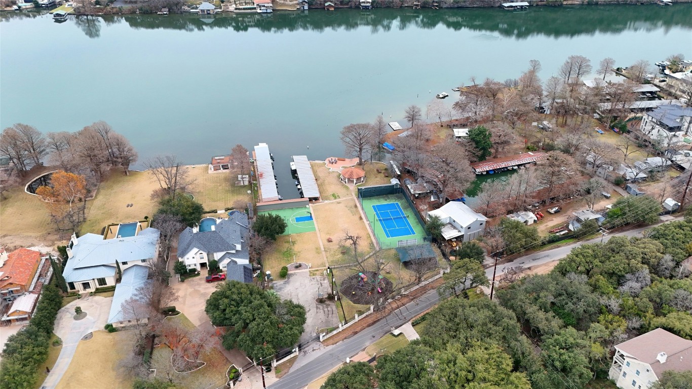 4207 Bennedict Lane Austin, TX 78746 - Photo 22 of 27 an aerial view of a house with a lake view