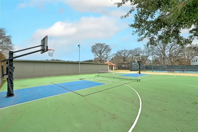 a terrace with outdoor seating and city view