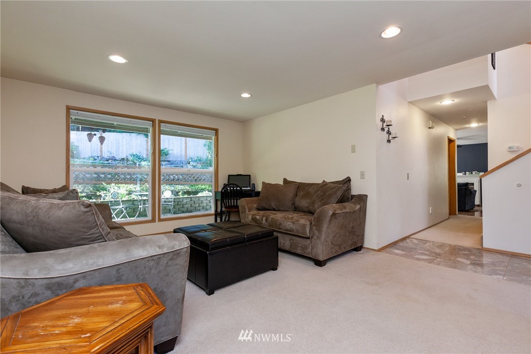 21814 4th Avenue Southeast Bothell, WA 98021 - Photo 2 of 25 a living room with furniture and a large window