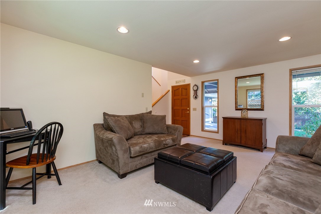 21814 4th Avenue Southeast Bothell, WA 98021 - Photo 3 of 25 a living room with furniture and a couch