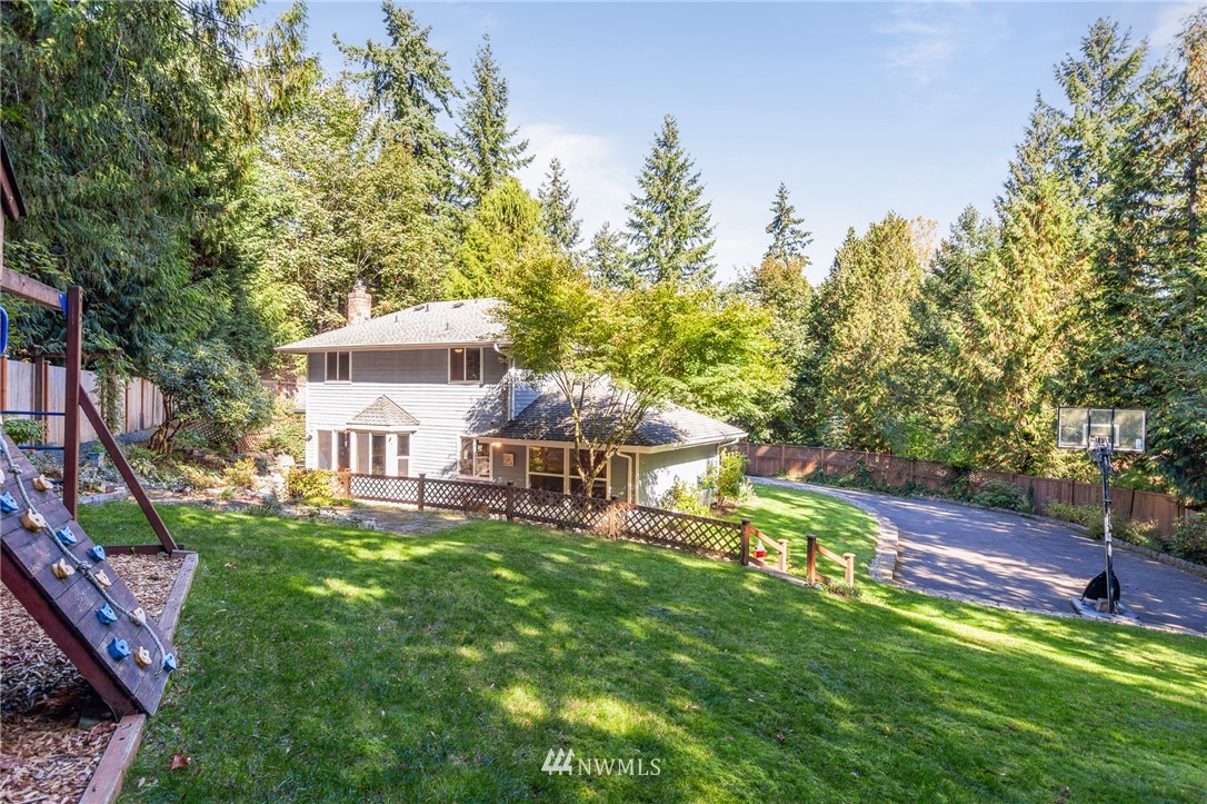 21814 4th Avenue Southeast Bothell, WA 98021 - Photo 22 of 25 a view of a house with a big yard and sitting area