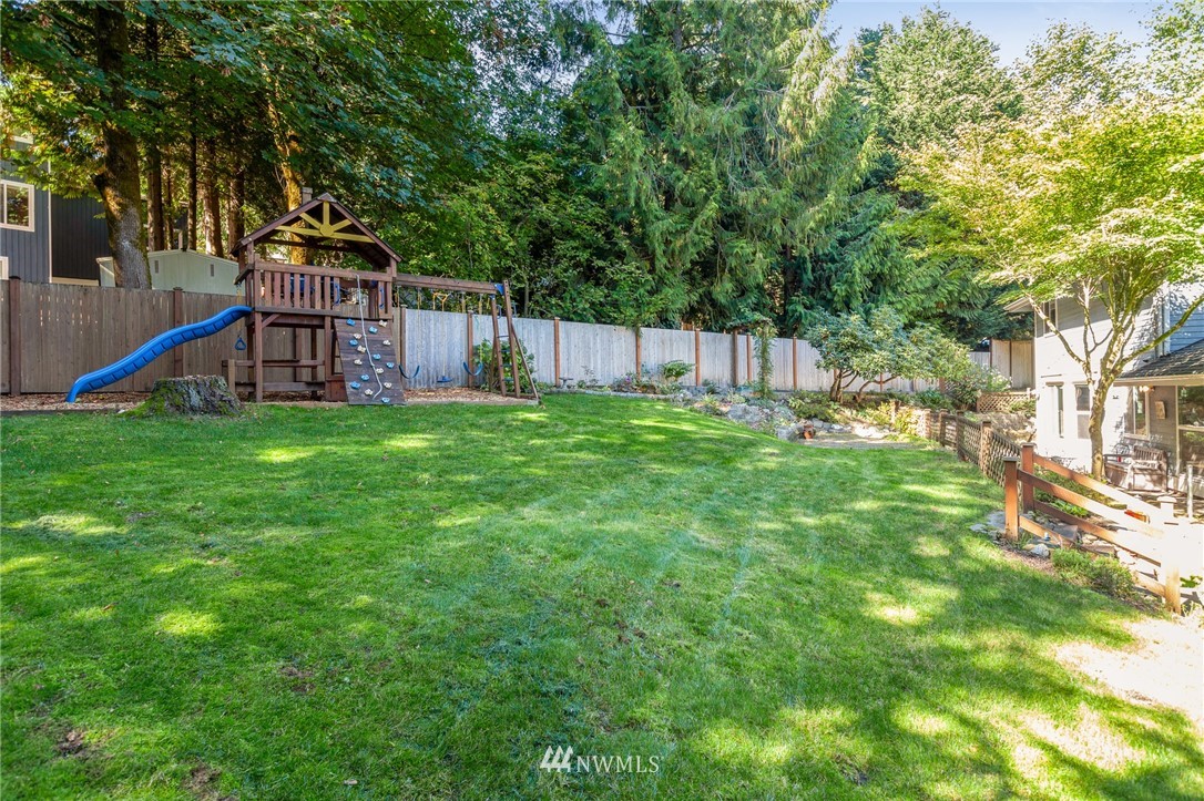 21814 4th Avenue Southeast Bothell, WA 98021 - Photo 23 of 25 a view of a house with a yard and sitting area
