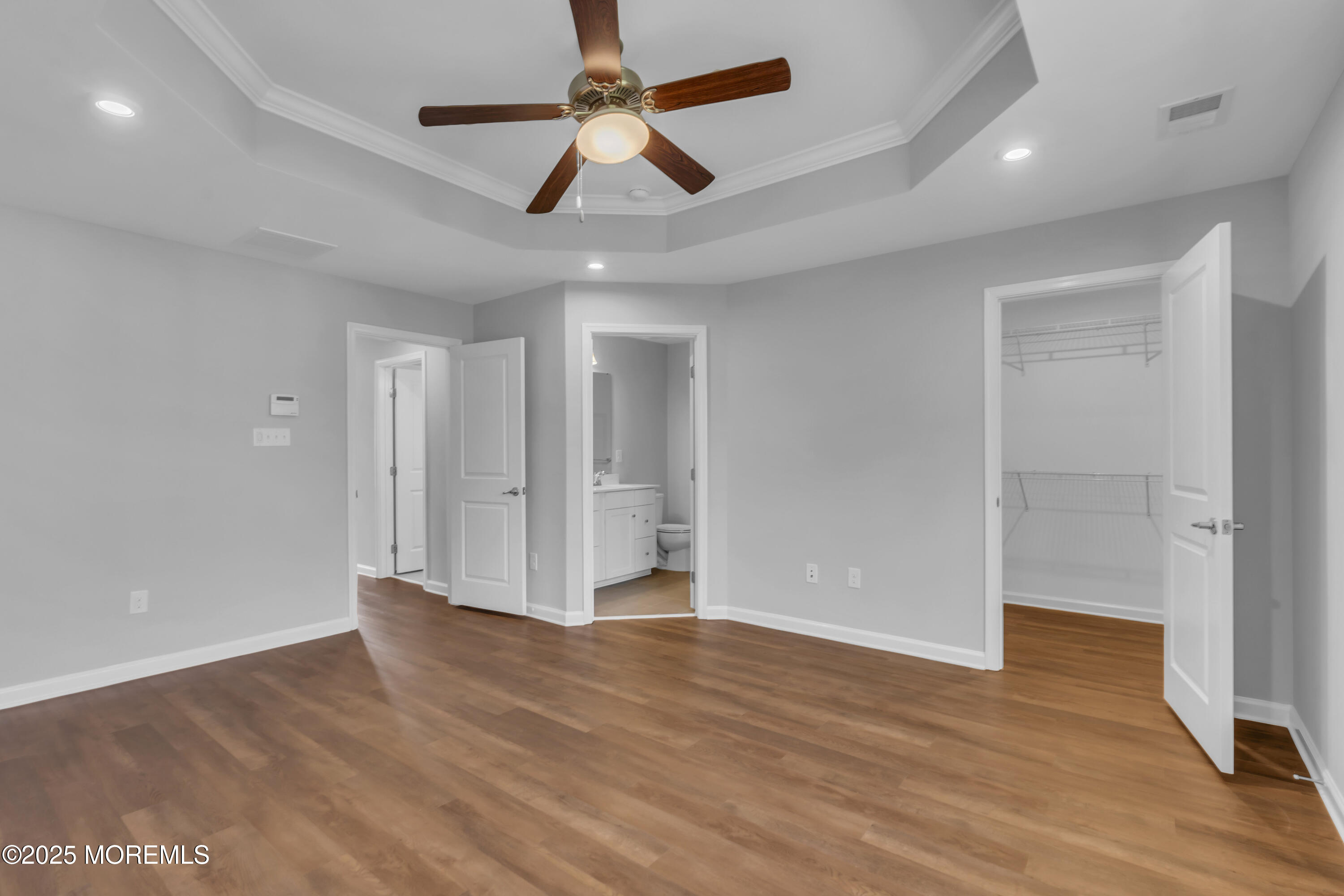 201 Rio Grande Drive Toms River, NJ 08755 - Photo 21 of 32 a view of an empty room with wooden floor