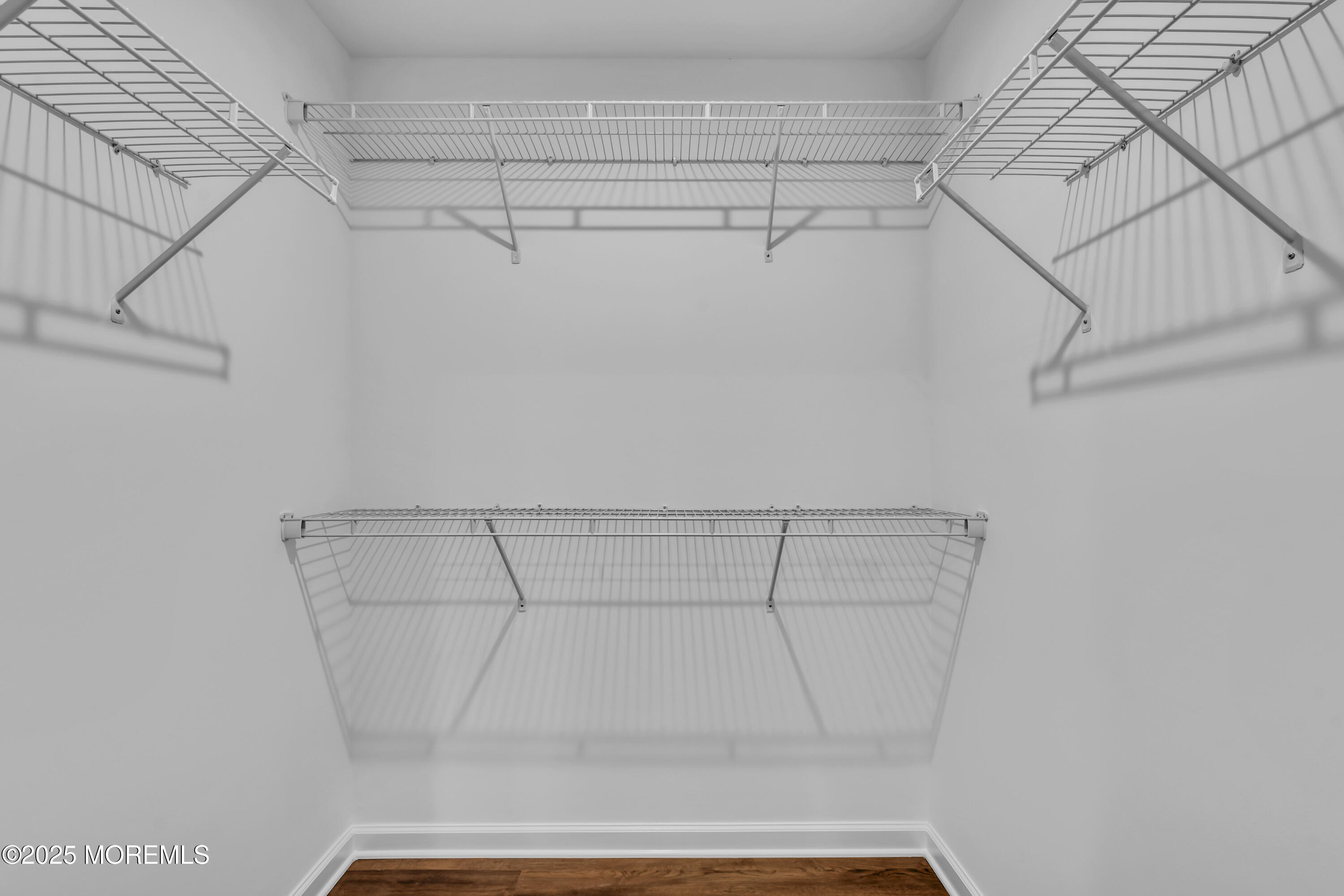 201 Rio Grande Drive Toms River, NJ 08755 - Photo 22 of 32 a view of a room with racks on the wall