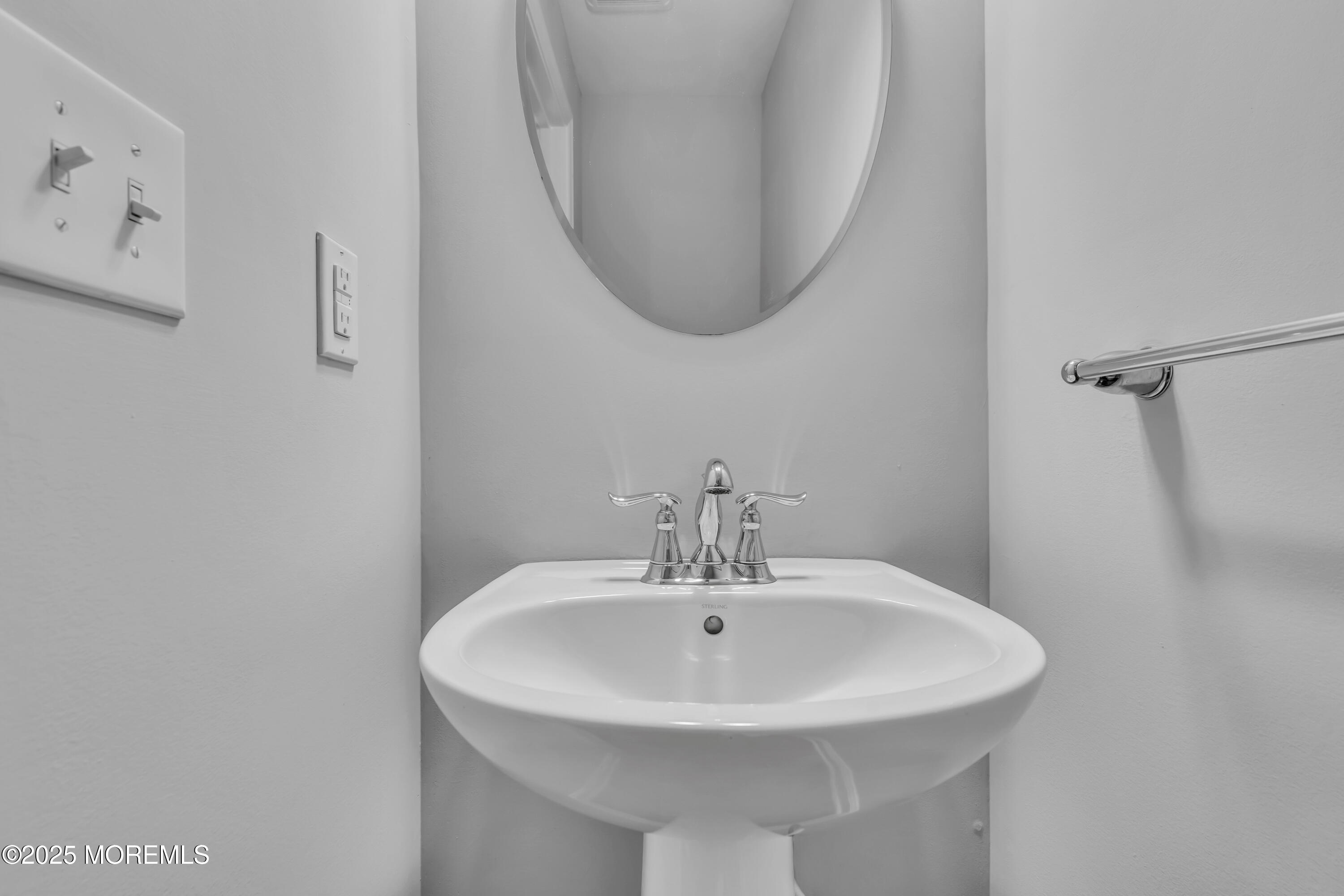 201 Rio Grande Drive Toms River, NJ 08755 - Photo 8 of 32 a sink with a mirror