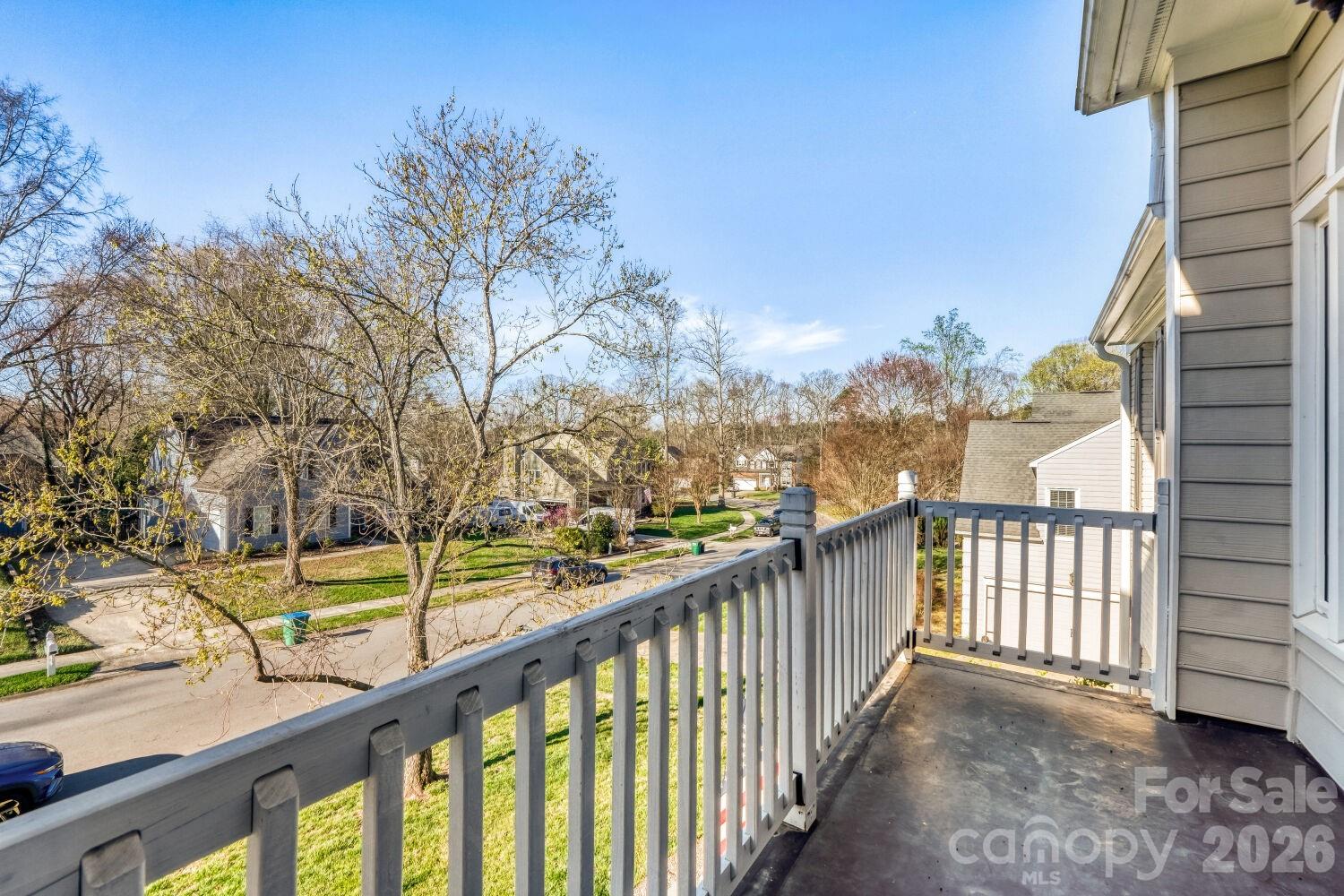 8607 Forest Shadow Circle Cornelius, NC 28031 - Photo 24 of 45 a view of balcony with wooden floor and fence