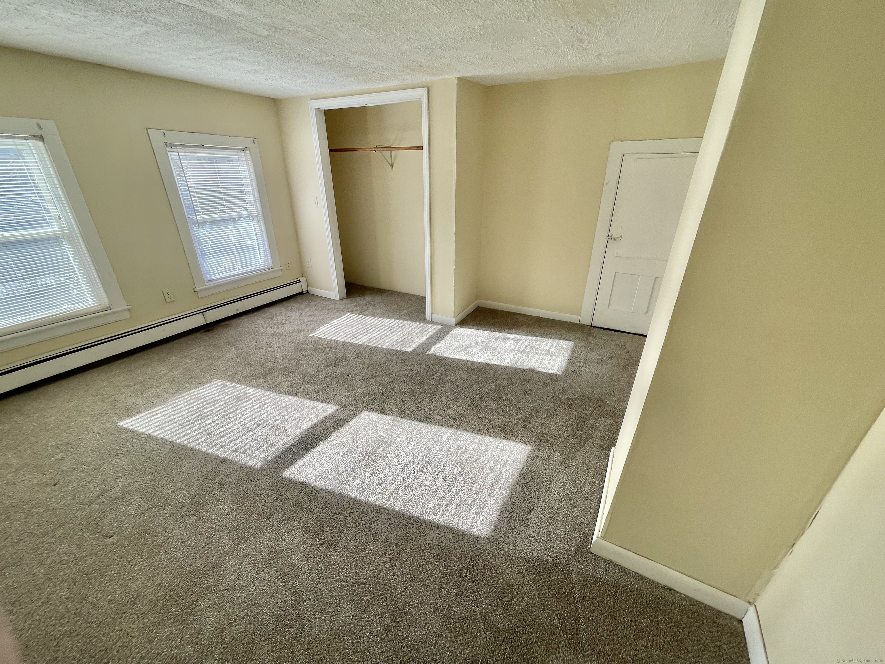 25 Pleasant Street Ansonia, CT 06401 - Photo 12 of 25 a view of an empty room