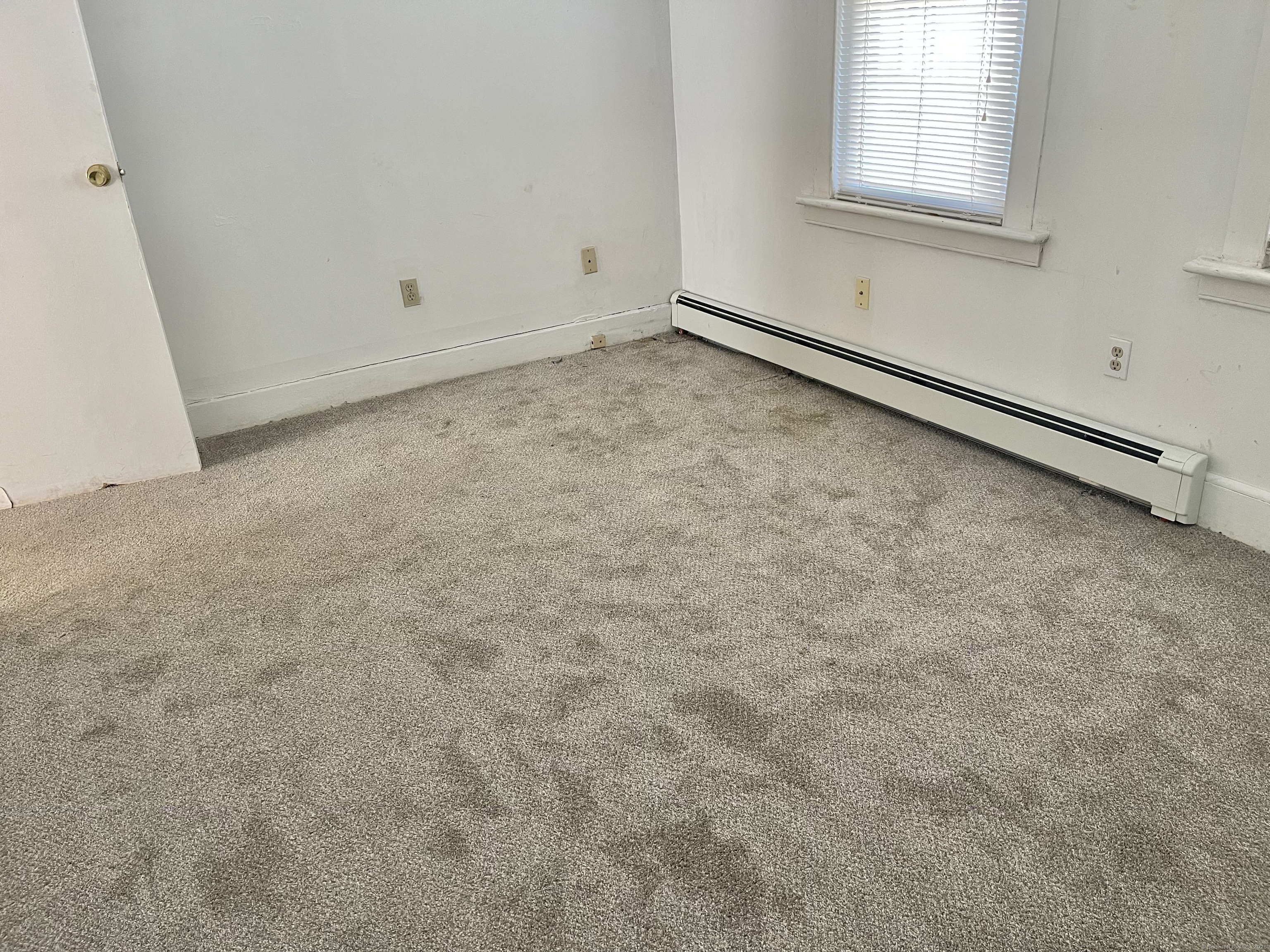 25 Pleasant Street Ansonia, CT 06401 - Photo 7 of 25 an empty room with a window
