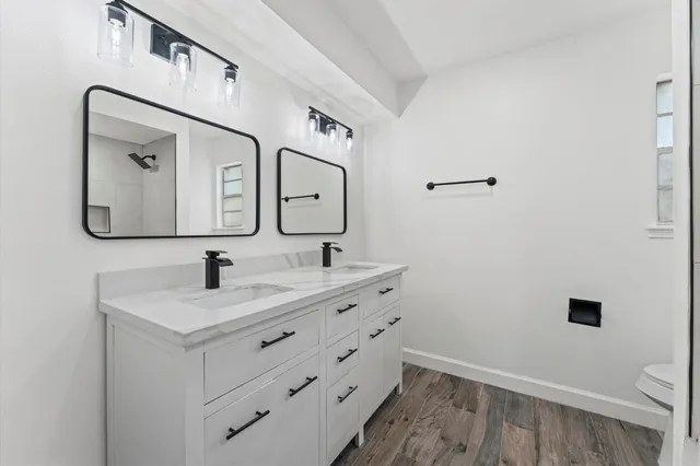 a bathroom with a bathtub and shower