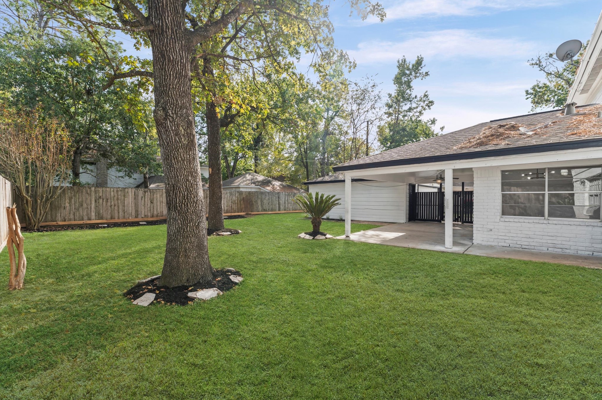 1123 Suwanee Lane Houston, TX 77090 - Photo 30 of 39 a view of a house with a backyard