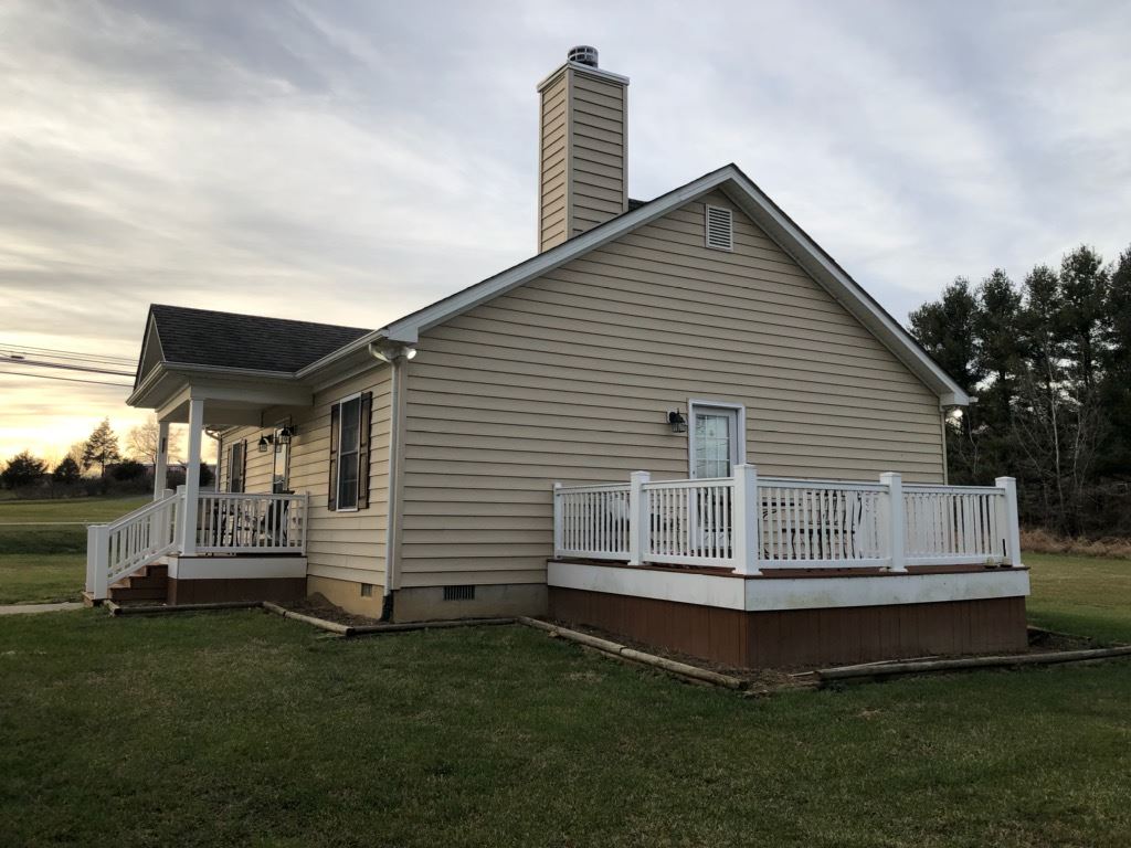 1692 Mt Torrey Road Lyndhurst, VA 22952 - Photo 12 of 14 a front view of a house with a garden